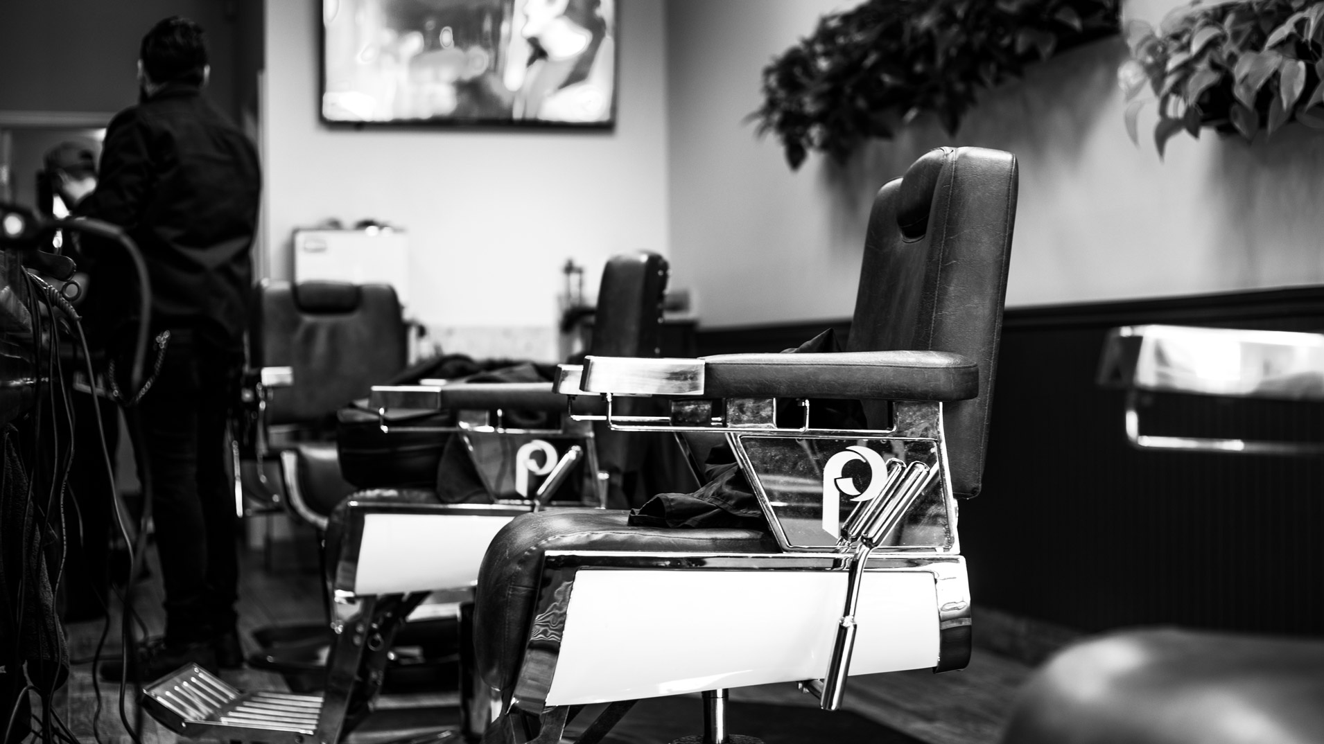 A classic leather barber chair at Gold Coast Barbers